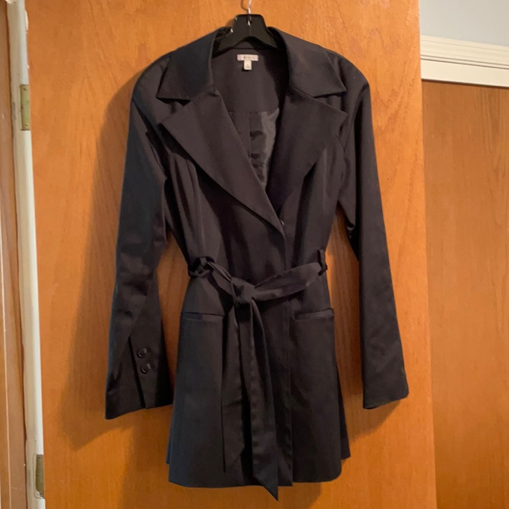 Almost new, knee length trench. No damage